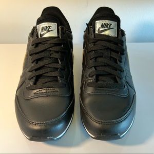 Black Nike with metallic accents